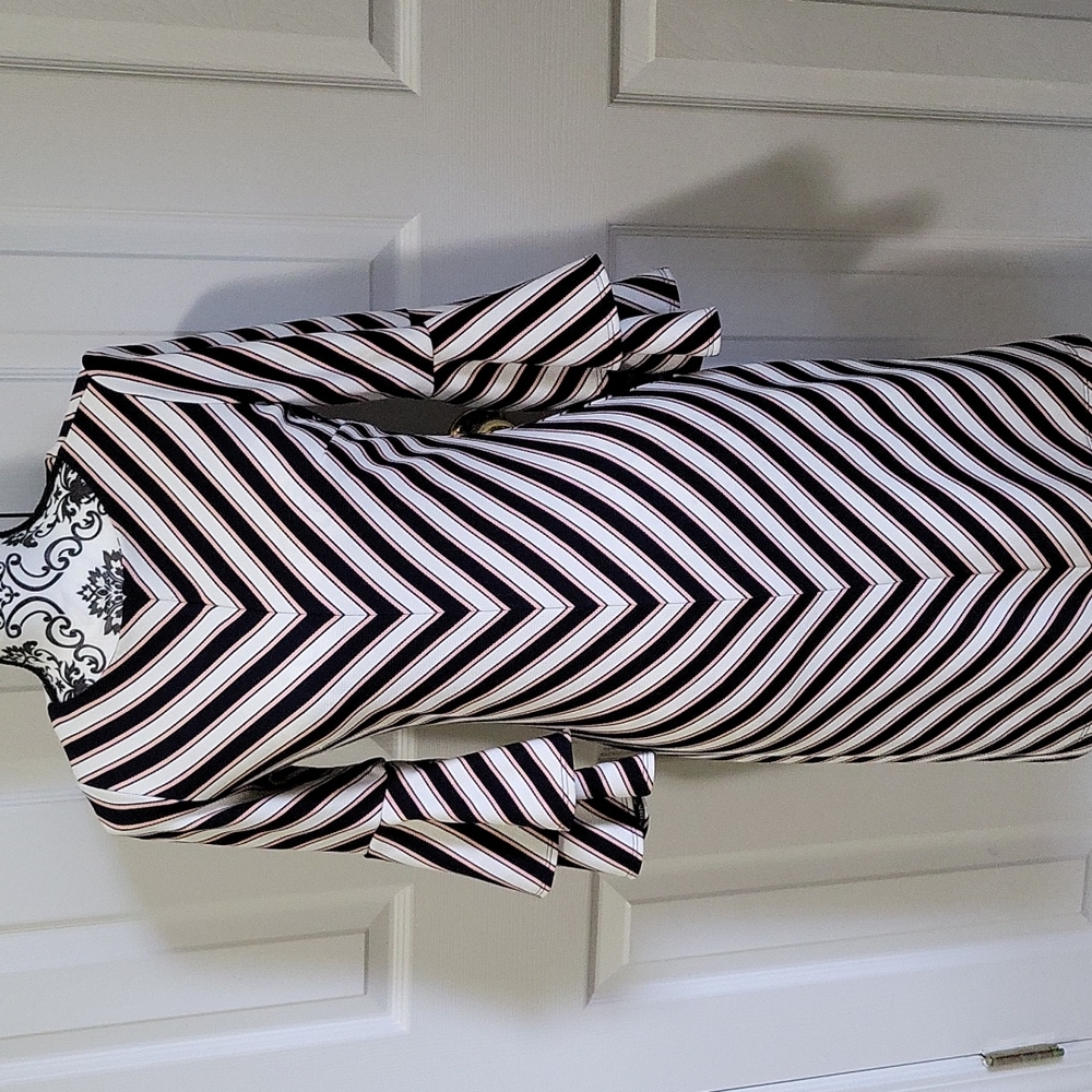 Chevron, pink, cream, and navy blue stripped dress.